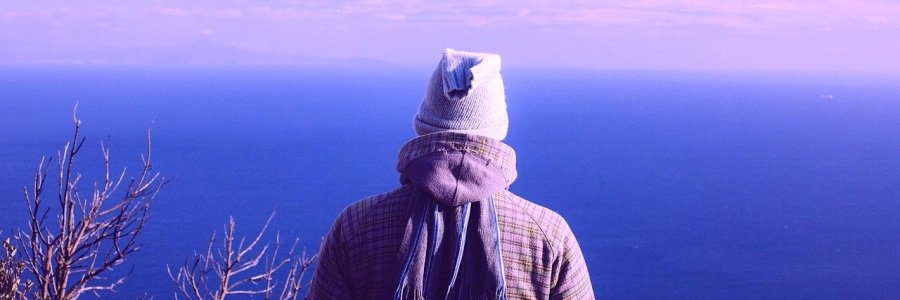 Man calmly viewing his surrounds after applying breath work and mindfulness
