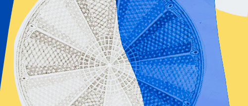 Spinning wheel on blue and yellow swirling background.